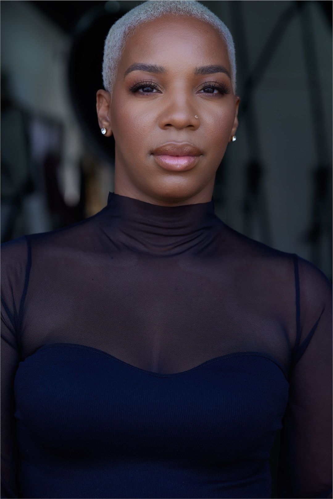 Portrait of Courtney Nevins, founder of DÉRA Skin OS